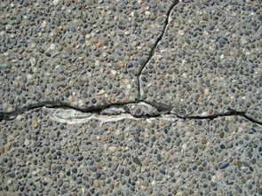 BEFORE exposed concrete aggregate Crack Repair...