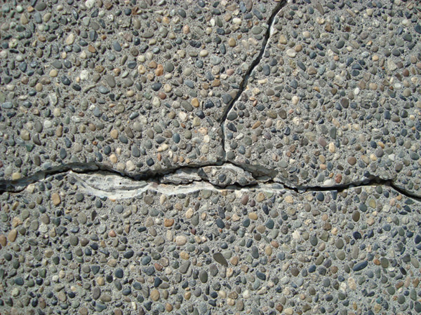 BEFORE exposed concrete aggregate Crack Repair...