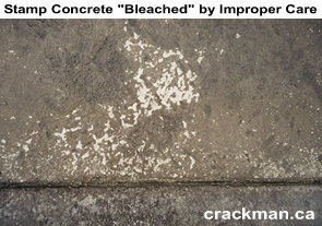 This photo shows a Rockprint stamp concrete driveway where the concrete sealer has been removed either by incorrect application of the sealer or removal of the concrete sealer from incorrect pressure washing or concentrated road salt dripping in the same place from the wheel wells of a vehicle.