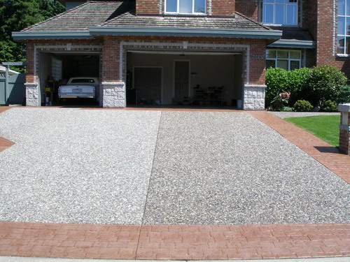 The Crackman custom tints your concrete driveway