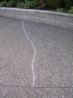 BEFORE exposed concrete aggregate Crack Repair...