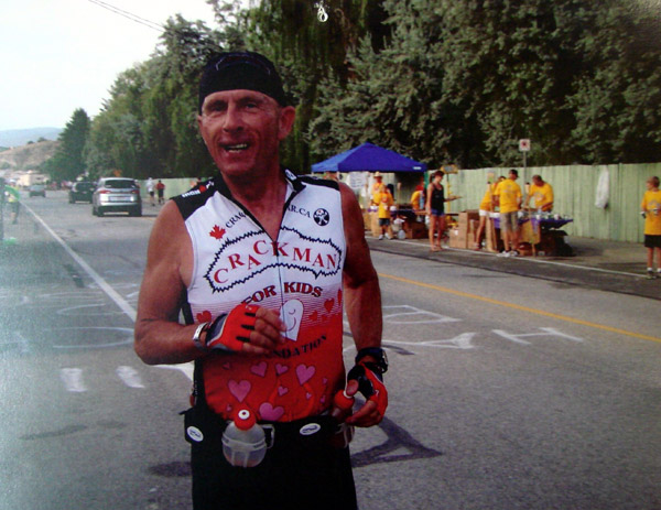 Gaynes The Crackman -always has a big smile - including during the running portion of the tough Penticton Ironman Triathalon.